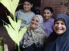 Urgent 24: There is something sweet in it.. A woman brings joy to the Copts on Palm Sunday in Minya