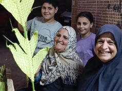 Urgent 24: There is something sweet in it.. A woman brings joy to the Copts on Palm Sunday in Minya